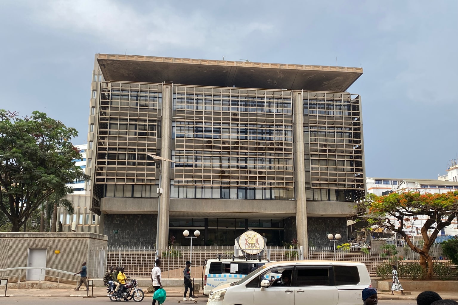 Exterior of the Bank of Uganda building in Kampala, with the bank emblem above the entrance.